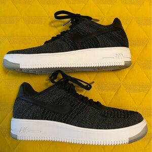 Women’s size 9 Nike Air Max in black knit.